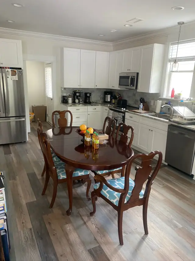 Kitchen and dining table at a Still Worthy residence